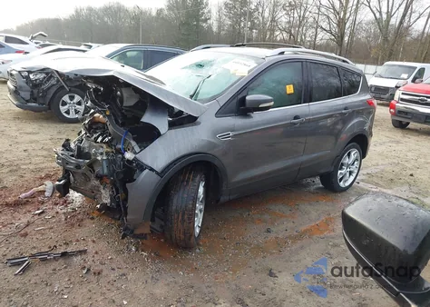 2014 Ford Escape Titanium z USA, uszkodzony, nr VIN 1FMCU0J98EUB68978